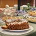 Borgo Palace Hotel in Sansepolcro buffet table with sliced cake, pastries and croissants