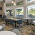 TownePlace Suites by Marriott San Jose Campbell lobby seating area with fireplace and large windows