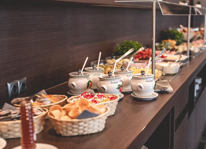 Plaza Hotel Hanau buffet table with soups, bread, and breakfast dishes in Hanau