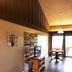 Ridgemark Golf Club And Resort in Hollister room with TV, wood accent wall and balcony view