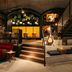 Ruby Hanna Hotel Stuttgart in Stuttgart lobby with staircase, guitar display, and warm lounge seating