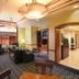 Residence Inn by Marriott Norfolk Airport lobby seating area with warm lighting and patterned carpet