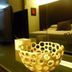 Zhuhai Zobon Art Hotel room with TV, bed, and modern decorative bowl in Zhuhai