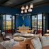 The Gordon Hotel in Eugene rooftop lounge with city views, blue walls, and hanging pendant lights