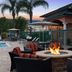 Residence Inn by Marriott Santa Clarita Valencia fire pit patio by the pool at sunset