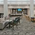 Hilton Garden Inn Birmingham SE/Liberty Park lobby lounge with seating and bar area