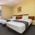 Capital O Hotel Suites Marne in Mexico City twin room with two beds and window view