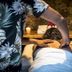 Hotel Vai Moana in Hanga Roa spa massage with candles and stone wall backdrop
