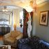 Auberge Marquis de Montcalm in Sherbrooke, ornate room with canopy bed and patterned armchairs
