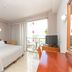 Hotel Marfil in Sant Antoni de Portmany: bright guest room with bed, TV, balcony and sliding glass door