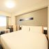 Richmond Hotel Tokyo Suidobashi guest room with double bed, desk, chair and window in Tokyo