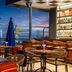 Golden Tulip Westlands Nairobi rooftop bar terrace with city skyline views at dusk