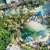 Aerial view of JW Marriott Gold Coast Resort & Spa in Surfers Paradise with lagoon pools and blue umbrellas