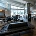 Residence Inn by Marriott Wilkes-Barre Arena lobby with seating, fireplace, and bar area in Wilkes-Barre