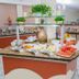 Hotel Vieira's in Balneário Camboriú buffet counter with fruit, pastries, and coffee service