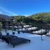 Mon Ing Dao in Mae Rim with rooftop pool loungers and hillside resort views under a blue sky