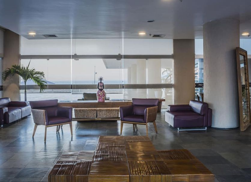 Hotel Resort Rio Poty in São Luiz lobby with seating area and large windows