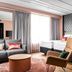Original Sokos Hotel Arina in Oulu guest room with two beds, armchair, sofa, and large window