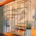 Harris Hotel & Convention Festival Citylink Bandung entrance with glass doors and orange floor