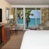 Ocean Breeze Inn Vero Beach room with oceanfront balcony view and king bed
