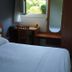 Hotel - Restaurant du Lac - Agen room in Boé with bed, desk, window and wardrobe