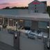 Hilton Garden Inn Cedar Falls outdoor patio with lounge seating at dusk in Cedar Falls