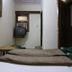 Yes Please Guest House New Delhi simple guest room with bed and wall-mounted TV