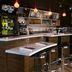 Courtyard by Marriott Kansas City East/Blue Springs bar with high stools and pendant lights in Blue Springs