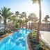 Palm-lined pool at Pickalbatros Golf Luxury Suites - All Inclusive in Sharm el-Sheikh
