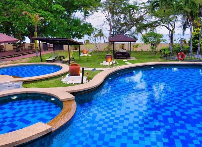 Sutera Sanctuary Lodges At Manukan Island in Kota Kinabalu, beachfront pool with tropical cabanas