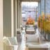 Outdoor hotel terrace at Hsm Hotel San Martino in Garbagnate Monastero with lounge seating and planters