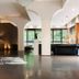 Hotel Michelangelo & Day Spa lobby in Montecatini Terme with modern seating and large windows