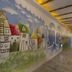 Kenting Sin Sin Hotel Iil in Hengchun Township hallway with colorful mural of whimsical houses