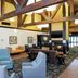 Hampton Inn & Suites Cleveland-Airport/Middleburg Heights lobby with seating area and fireplace
