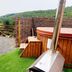 Dolgun Uchaf Guesthouse in Dolgellau with outdoor hot tub and hill views