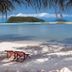 Baan Manali Resort in Ko Pha Ngan with beach loungers and calm turquoise bay views