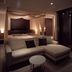 Sumiya Kiho-An Ryokan in Kameoka bedroom with canopy bed, sofa, and glass-enclosed balcony