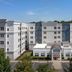 Residence Inn by Marriott Birmingham Hoover exterior with central entrance and landscaped courtyard in Hoover