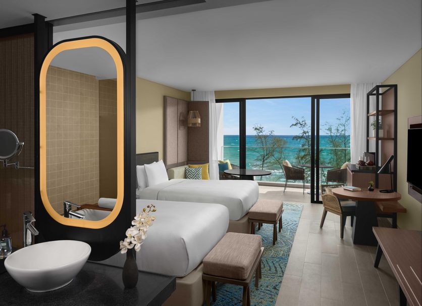 Crowne Plaza Phu Quoc Starbay By IHG room with ocean view balcony and twin beds in Phu Quoc