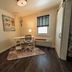 Eo Bungalows, Custer room with desk, chair, window and dark wood flooring