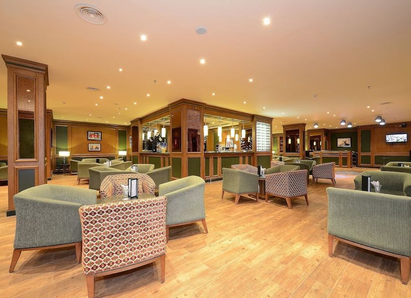 Stella DI Mare Beach Hotel & Spa in Sharm el-Sheikh lounge with wood floors and seating area