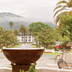 Silverado Resort in Napa with a mountain view, palm trees, and a landscaped entrance courtyard