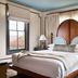 Zelda Dearest in Asheville, a stylish guest room with a king bed and large window
