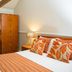 The Peel Aldergate, Tamworth: guest room with double bed, desk, wardrobe and wall-mounted TV