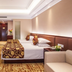 Hangzhou Sailing International Hotel room in Hangzhou with twin beds and a seating area