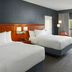 Courtyard by Marriott Nashville Brentwood guest room with two beds and balcony view in Brentwood
