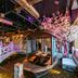 Grand Pacific Hotel Ningbo in Ningbo features an indoor gondola-style dining area with pink blossoms
