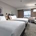 Freepoint Hotel Cambridge, Tapestry Collection by Hilton room with two beds and city view