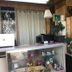 Diamond View Motel, Susanville lobby with potted plants, front counter, and display shelves