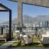 The Silo Hotel Cape Town rooftop terrace with lounge chairs and Table Mountain views